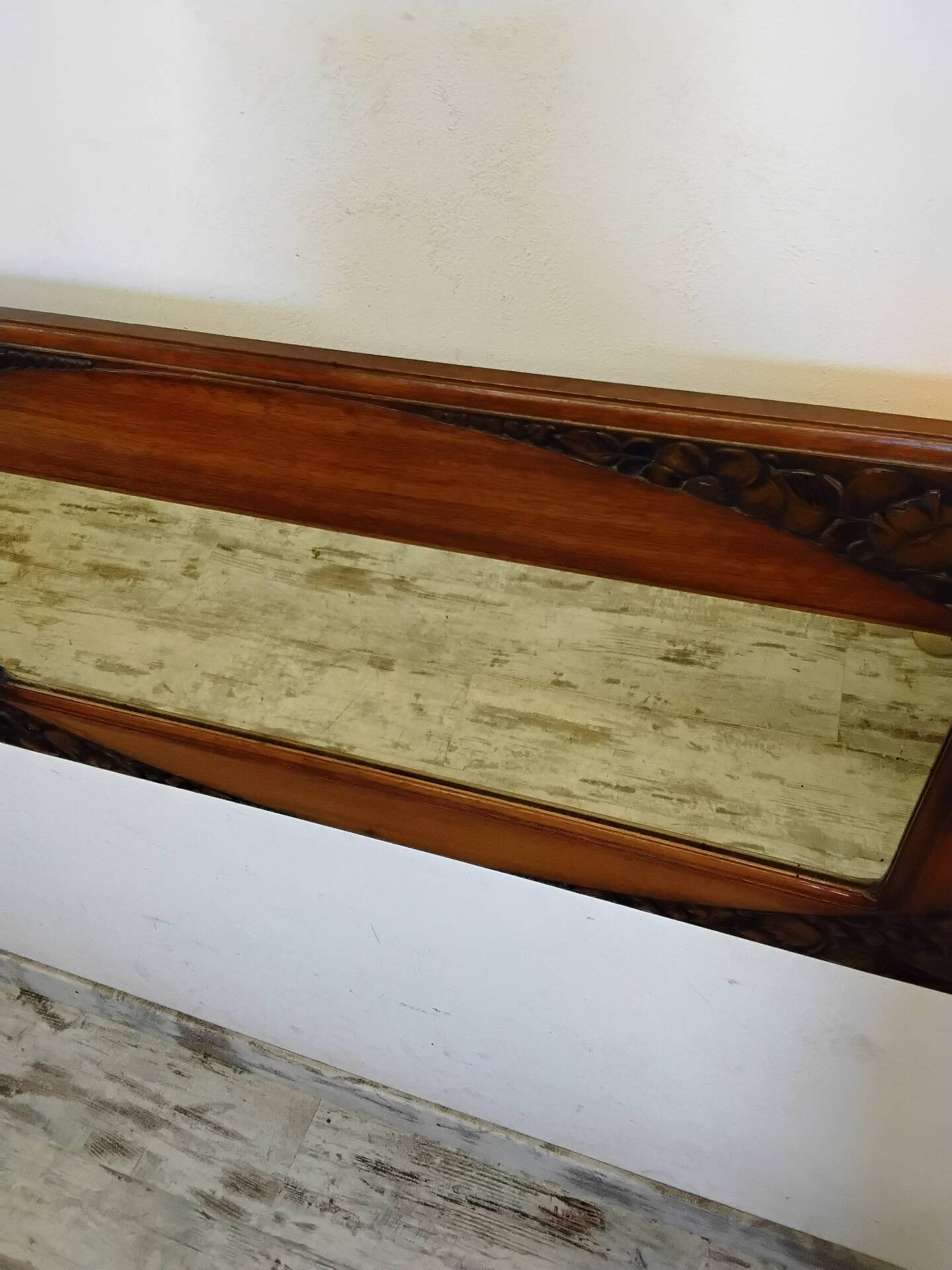 Art Deco mirror with a wooden frame