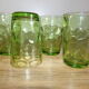 4 old green glasses