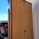 Corner glazed corner cabinet in old cherry wood 1900s