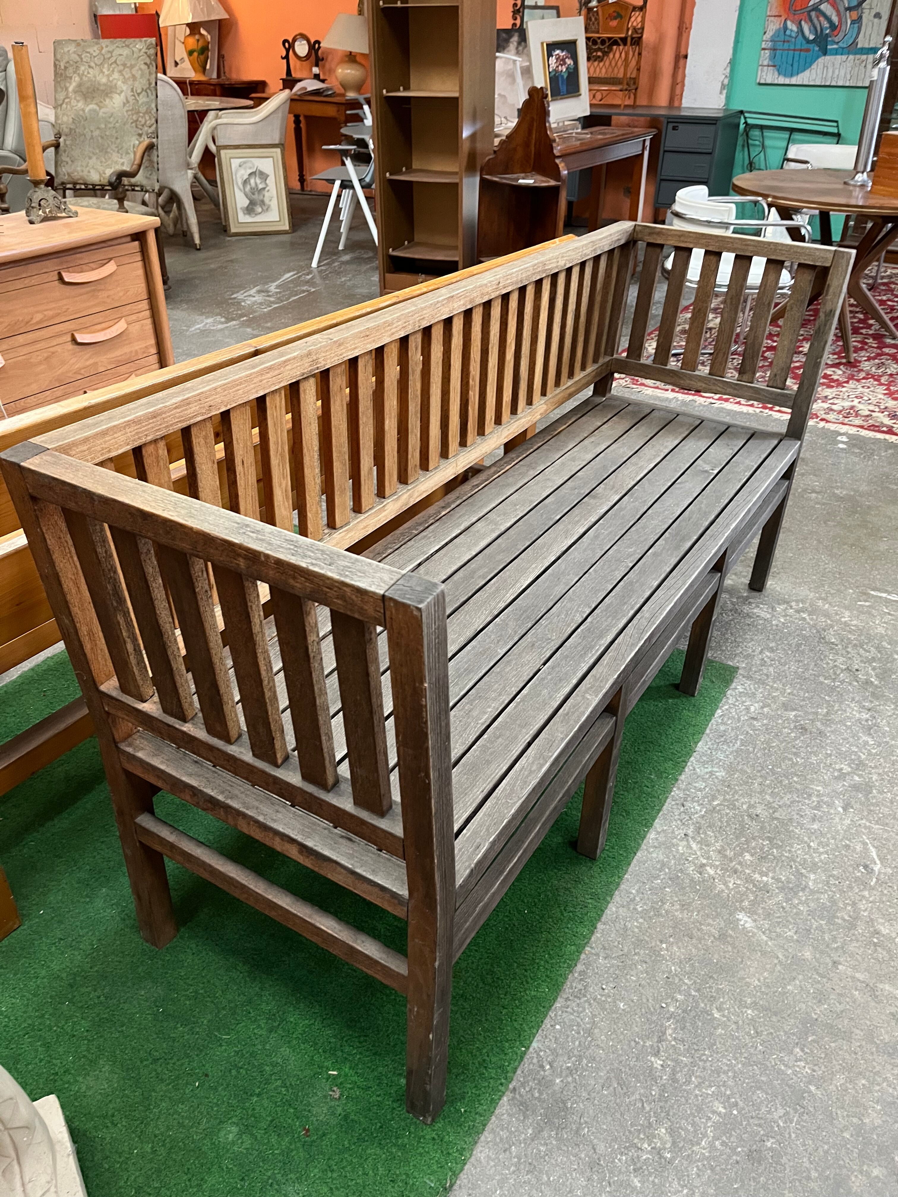 Colonial-style teak bench