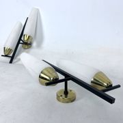 Mid-Century pair of double lights sconces in brass and opaline glass. Italy 1950s