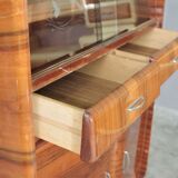 Rounded furniture from the 1950s in cherry veneer