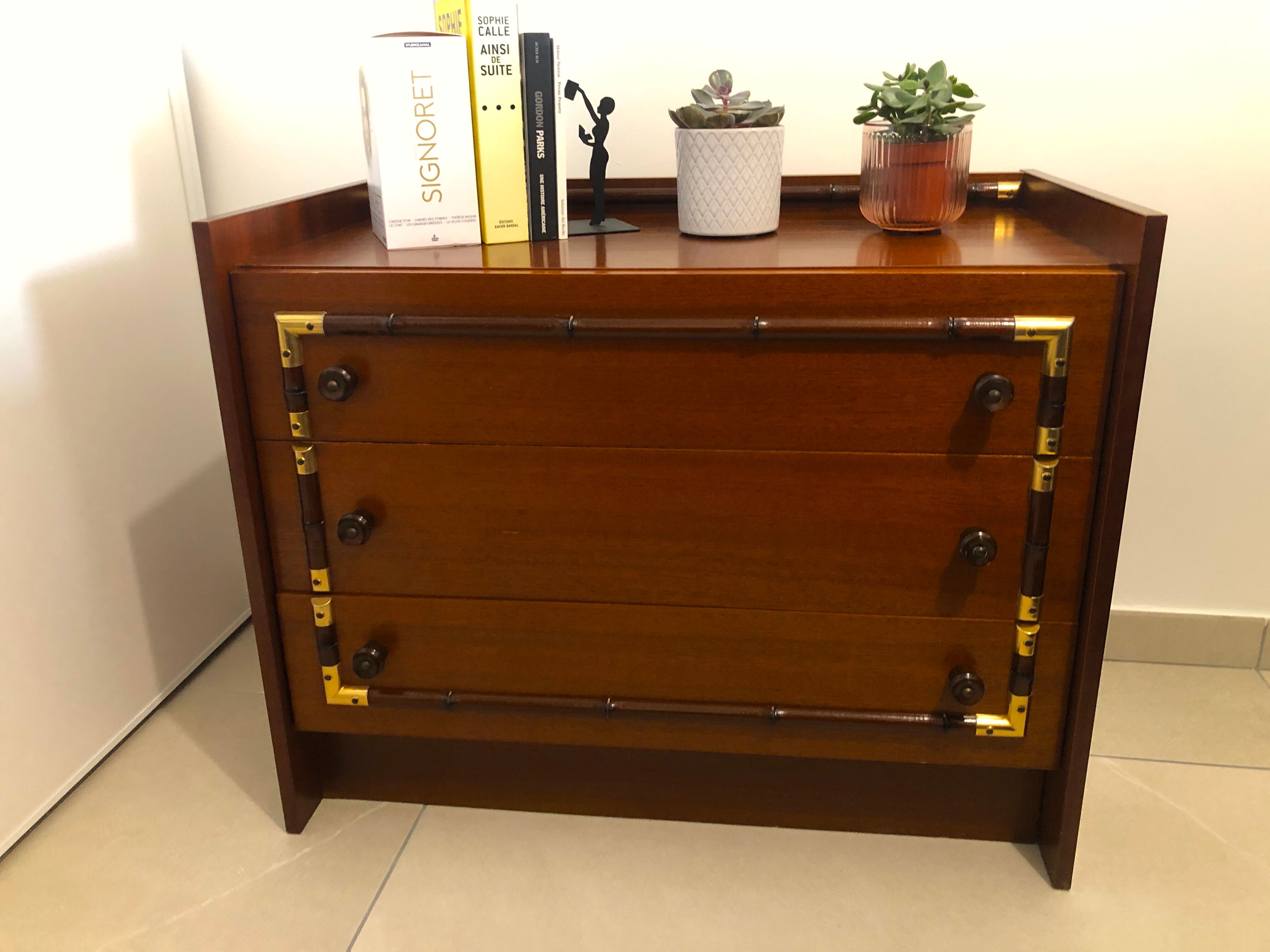 Vintage wooden and gilded chest of drawers colonial style