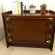 Vintage wooden and gilded chest of drawers colonial style