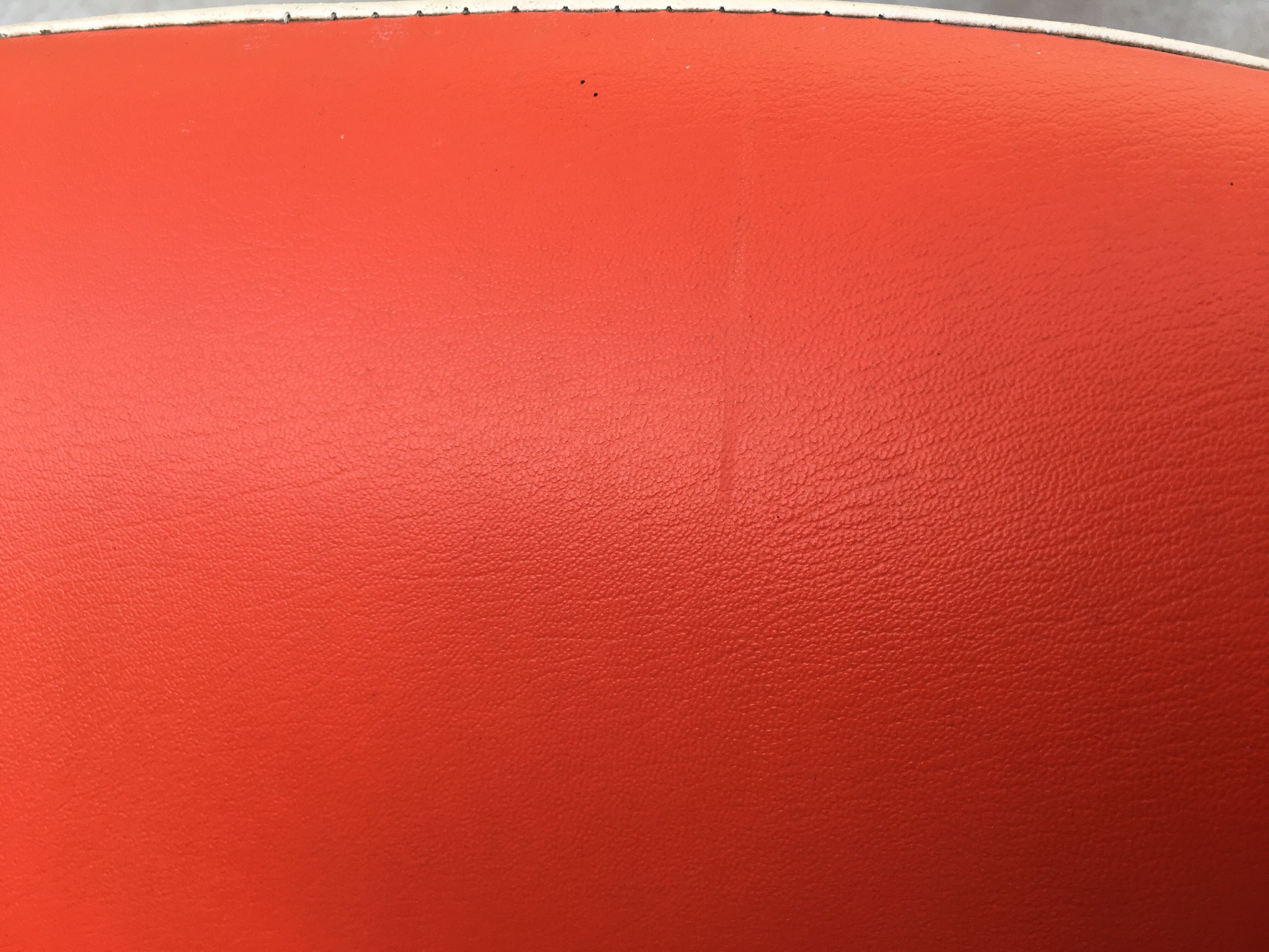 Orange tulip foot armchair