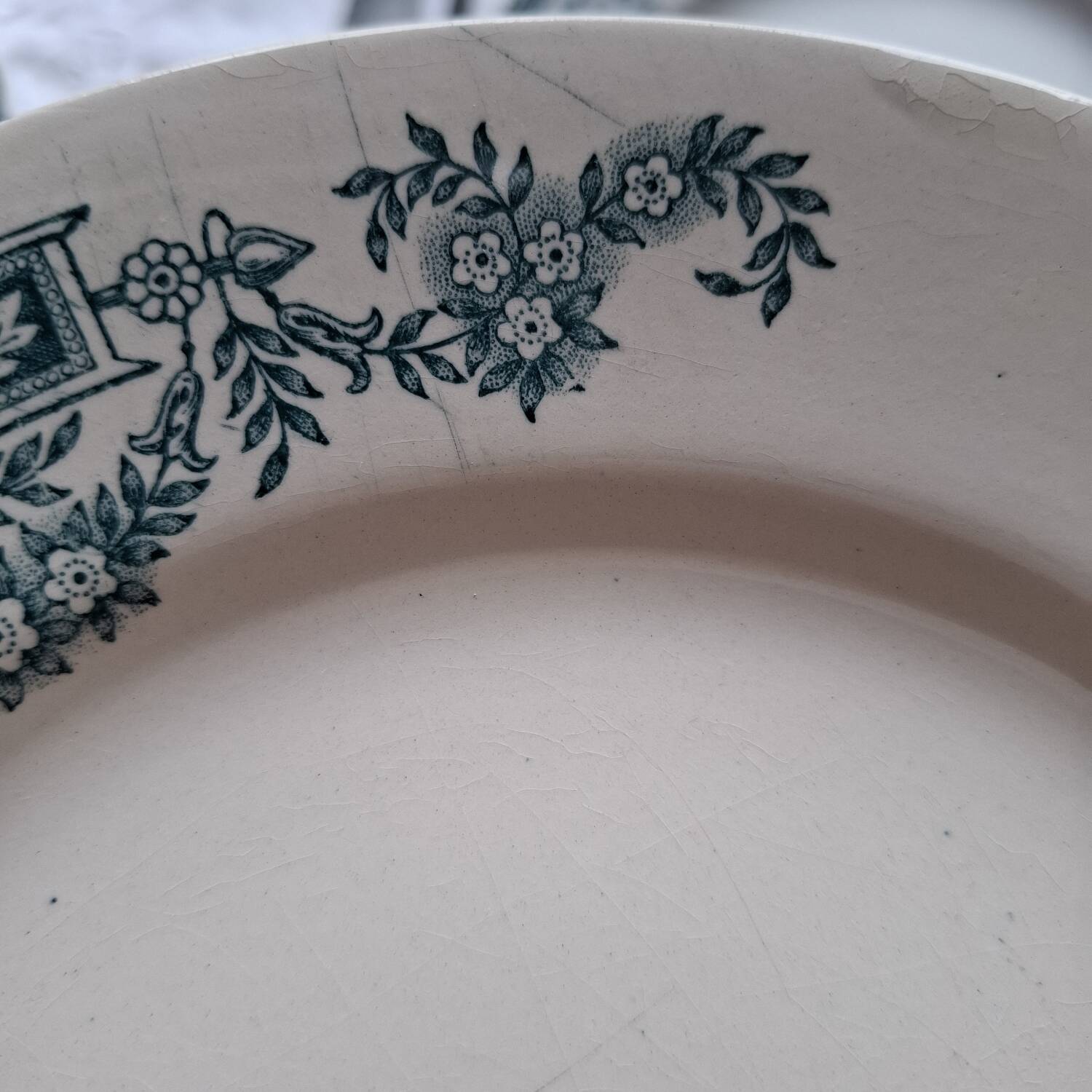 Mismatched old flat plates in iron earthenware
