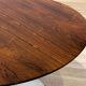 Round coffee table by Arkana (rosewood)