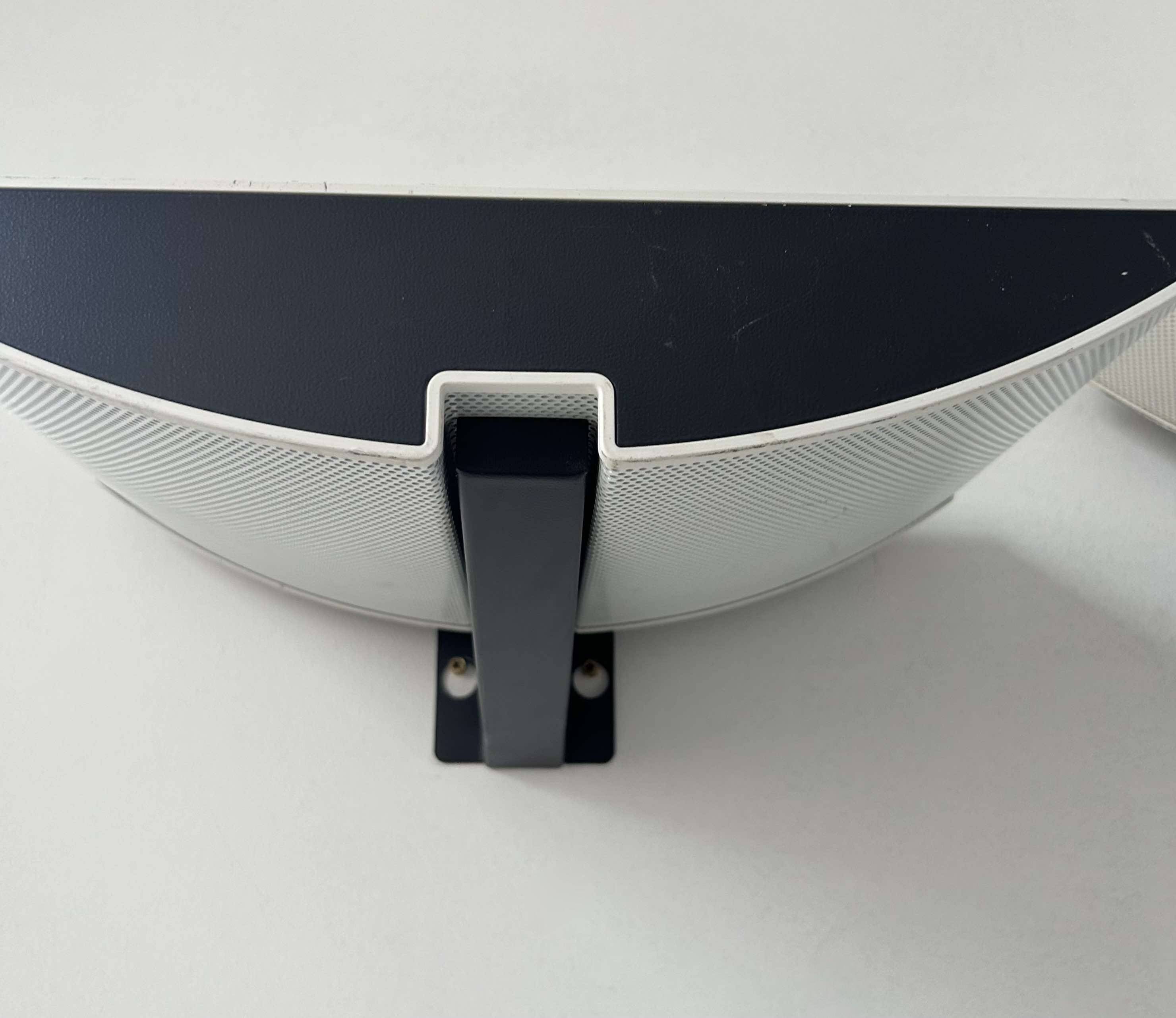 Pair of modernist wall lights, black and white lacquered metal, Italy 1980