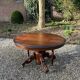 Large oval mahogany dining table from the 19th century Restoration period