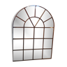 Old rounded industrial mirror factory window impost