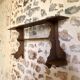 Wooden wall-mounted spice rack