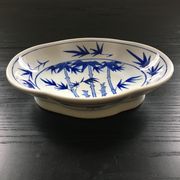 Chinese cup decorated with blue bamboo.