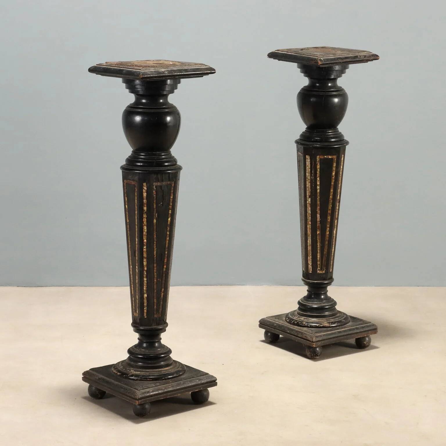 Antique ebonised wood and mother-of-pearl columns, 19th century