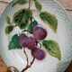 Old barbotine plate with plum motif Saint Amand Hamage