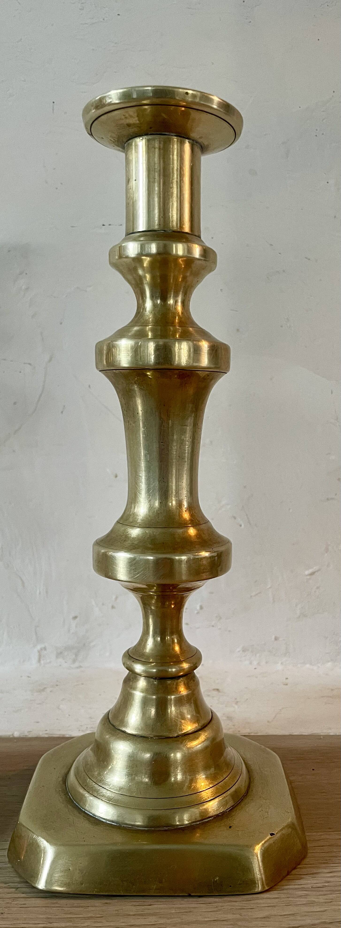 Pair of brass candlesticks from the 19th century.