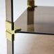 Hollywood Regency coffee table in smoked glass – Modular brass construction