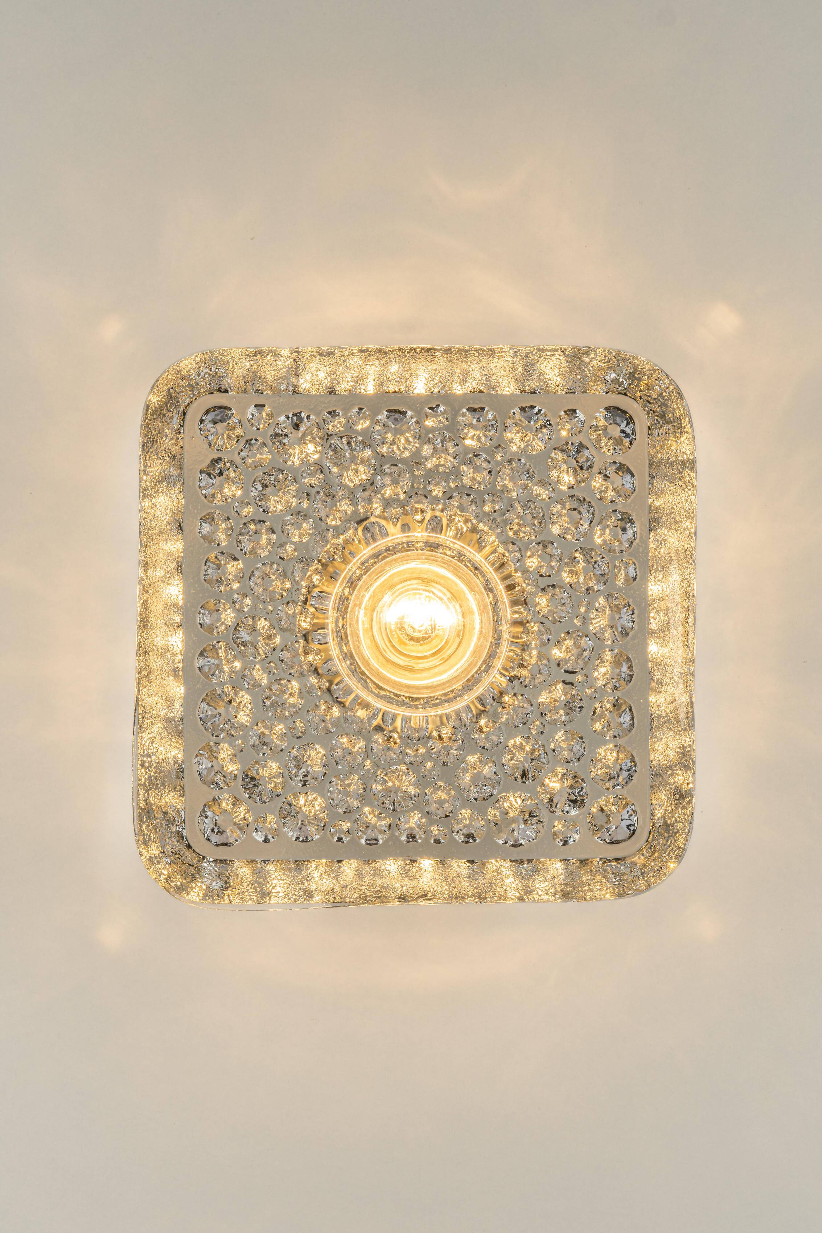 Exclusive Sputnik wall sconces in crystal by Peill & Putzler, Germany.