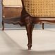 Simple bed in Barocchetto style in walnut.
