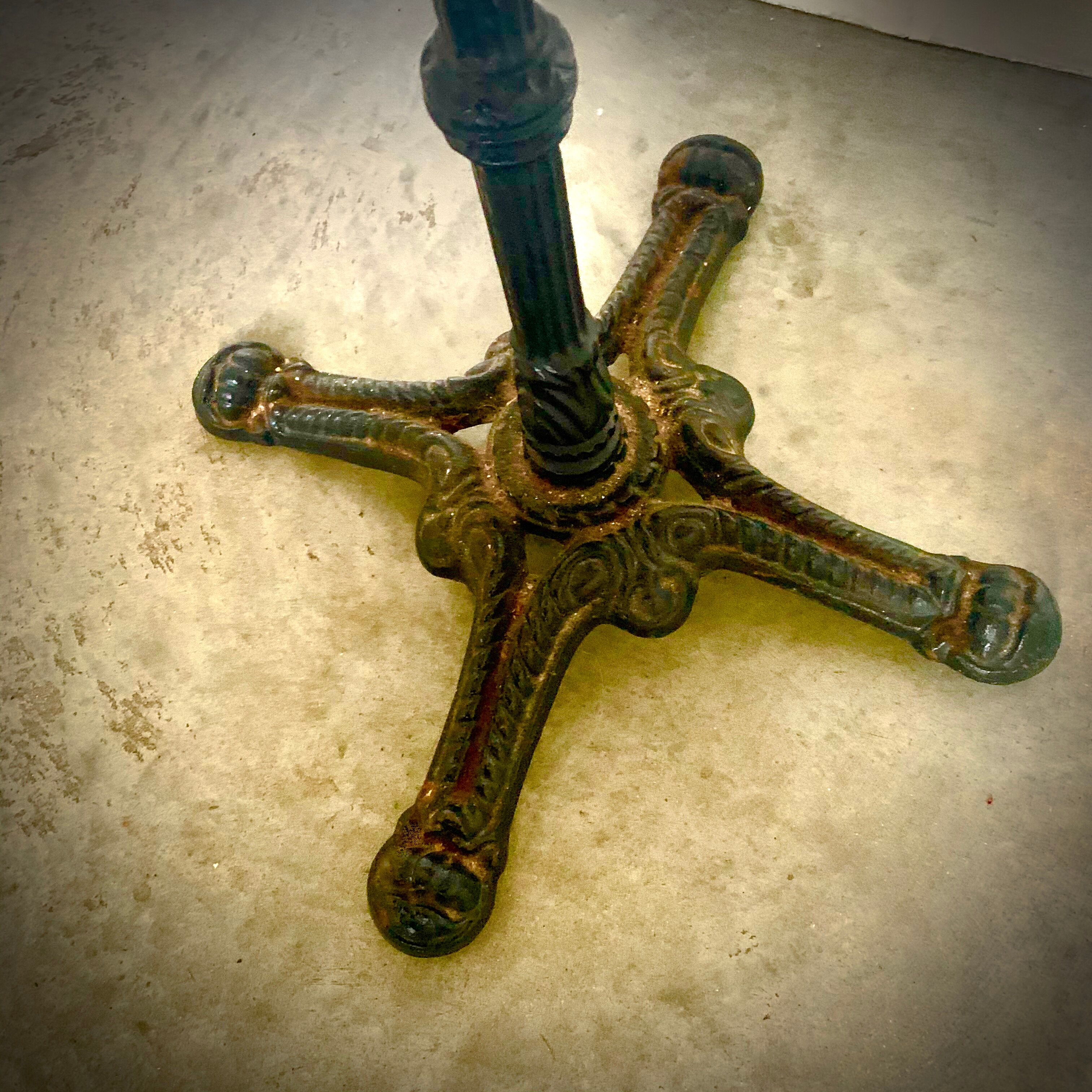 Bistro table with cast iron foot and marble tray