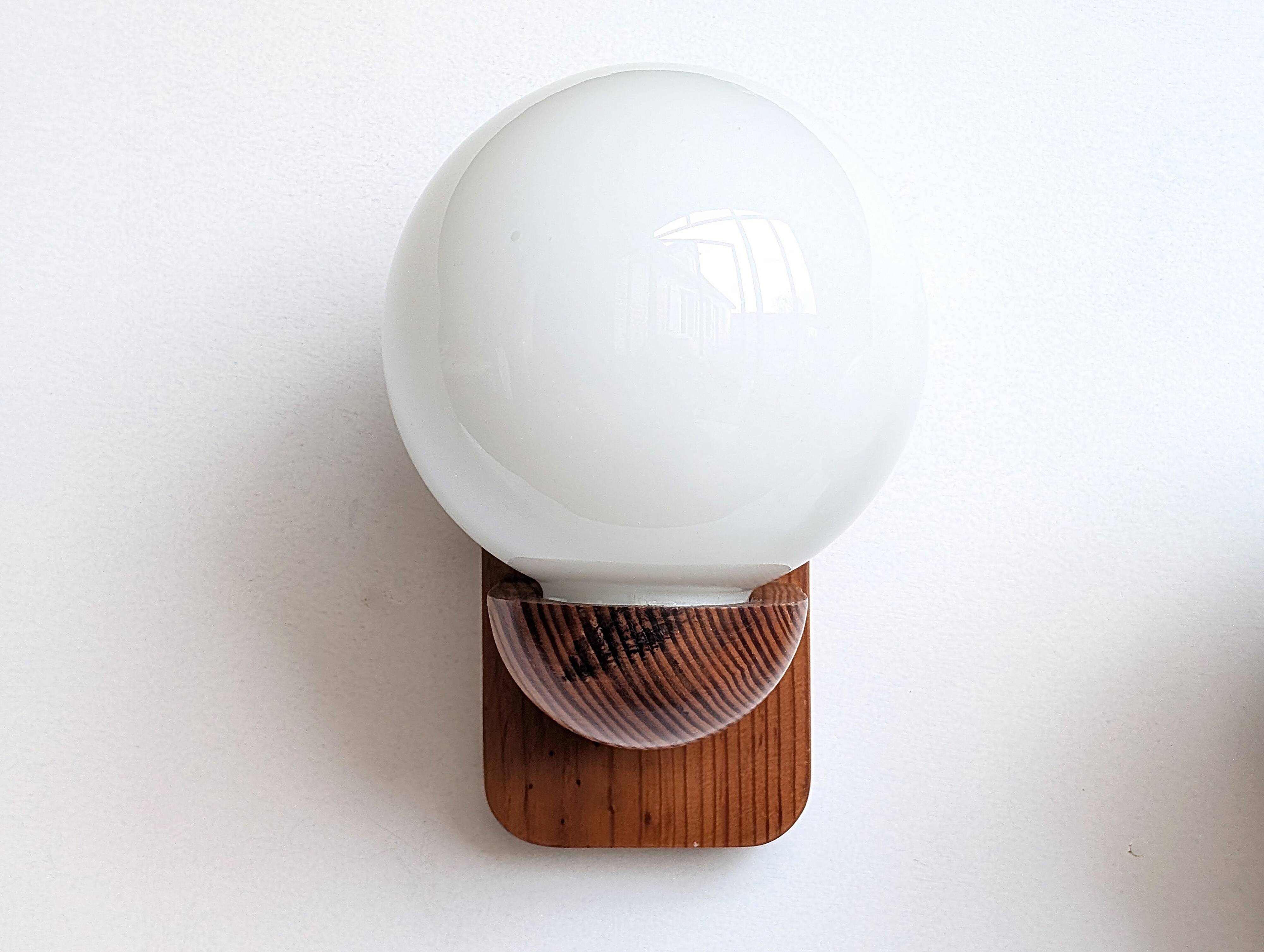 Pair of solid pine and opaline wall lights