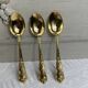 Dessert spoons and serving ladle