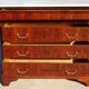 Antique mahogany chest of drawers with white marble.