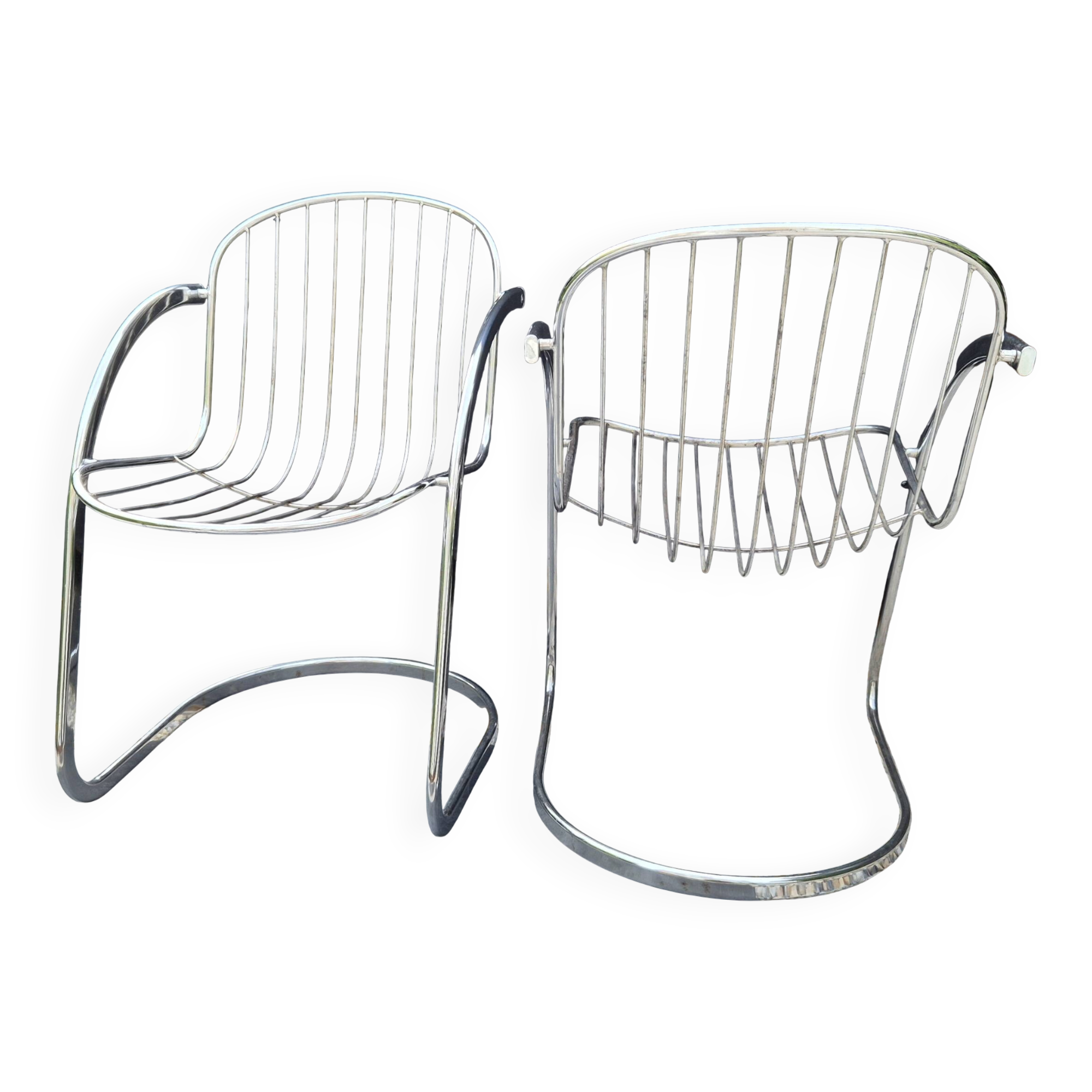 A pair of space age wire chairs