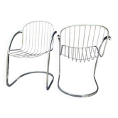 A pair of space age wire chairs