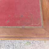 Old wooden desk, red felt top
