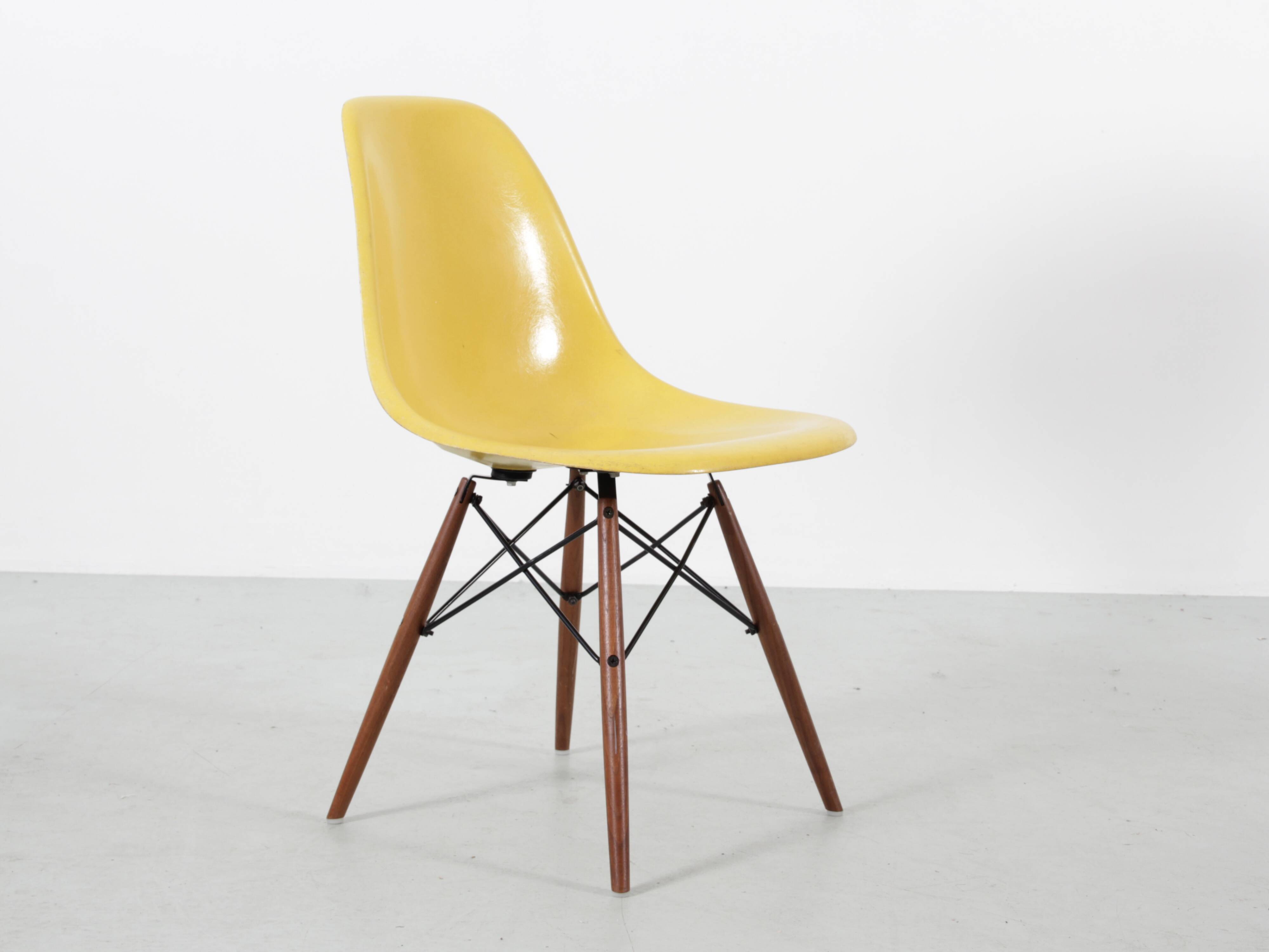 Set of 4 DSW chairs by Charles Eames - yellow fibreglass edition by Herman.