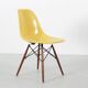 Set of 4 DSW chairs by Charles Eames - yellow fibreglass edition by Herman.