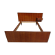Vintage bed in teak with integrated bedside table.