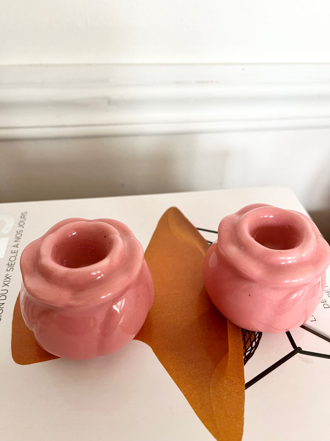 Pair of pink ceramic candle holders