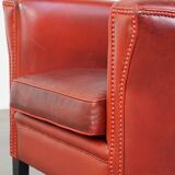 Fauteuil en cuir de mouton rouge