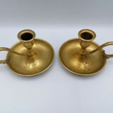 Pair of brass hand candlesticks
