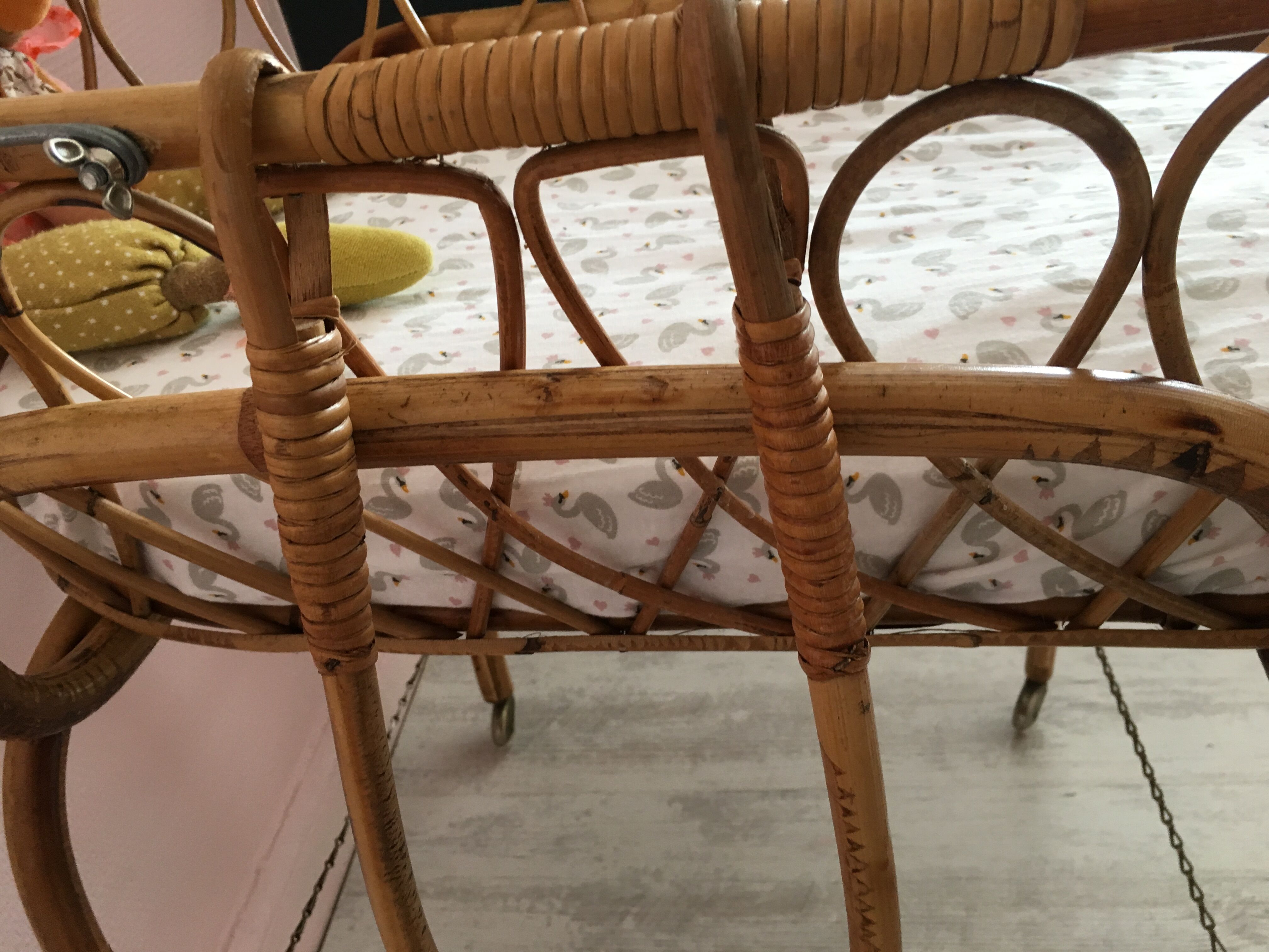 Rattan cradle on foot