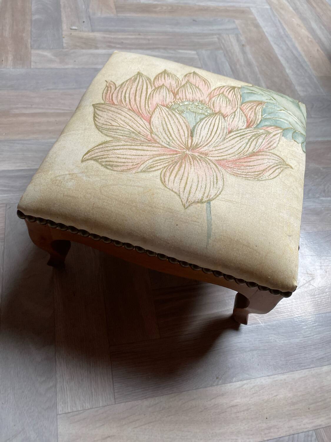 Vintage upholstered stool/footrest