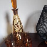 Amber crystal decanter and 5 matching glasses.