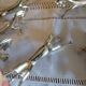 Silver metal horse-shaped knife rests