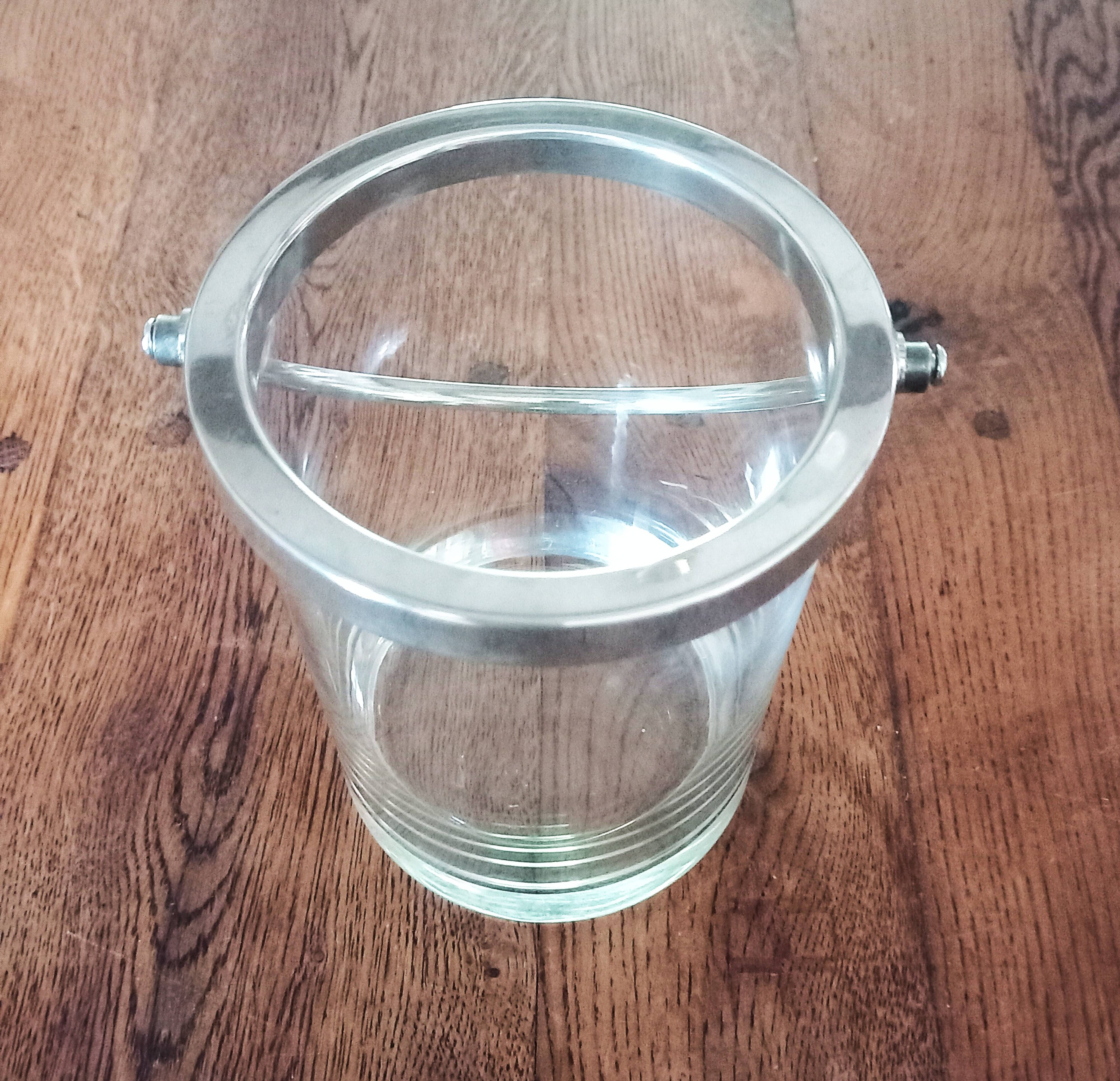 Glass and silver metal ice bucket