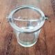 Glass and silver metal ice bucket