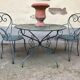 1 Table and 2 wrought iron garden chairs 1950 vintage
