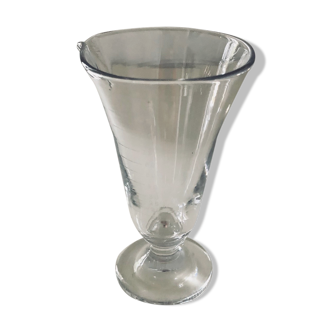 Old graduated pouring glass