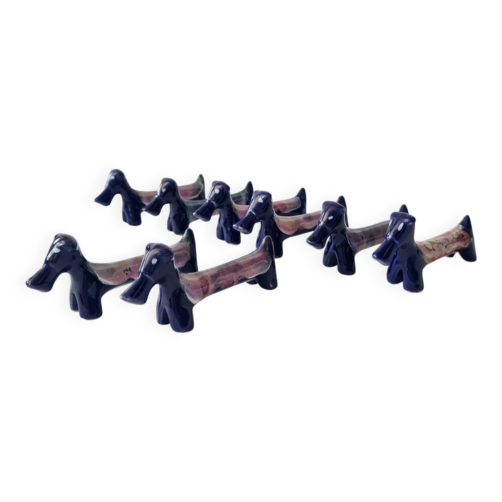Set of 8 vintage ceramic knife rests, retro dog design.