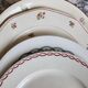4 mismatched vintage flat plates with floral pattern - Lot Rosa