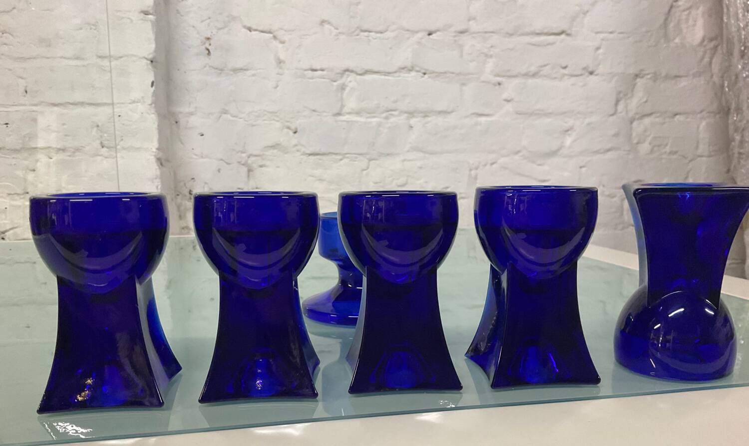Set of 7 vintage cobalt blue glass footed candlesticks