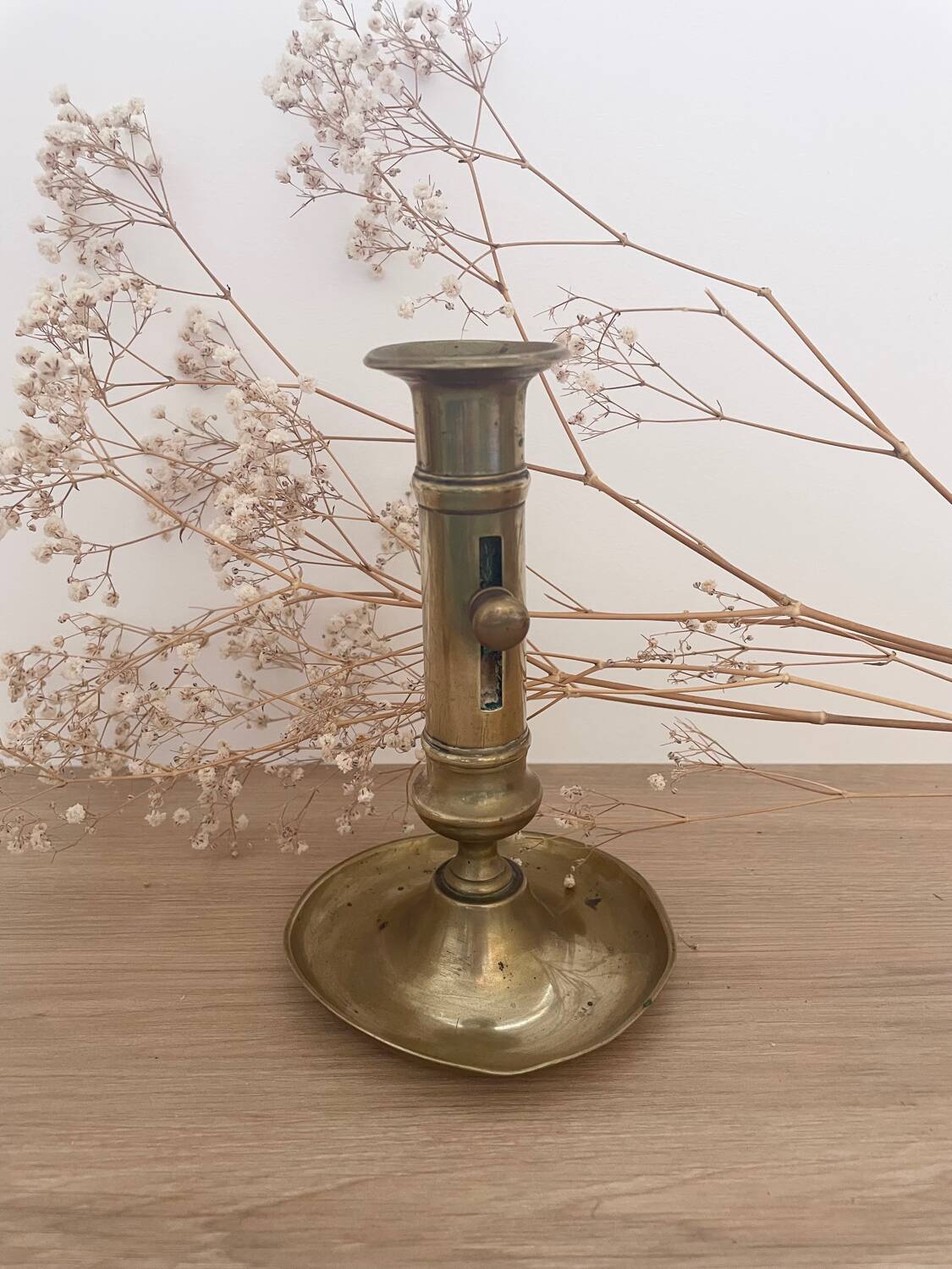 Brass candle holder with push button