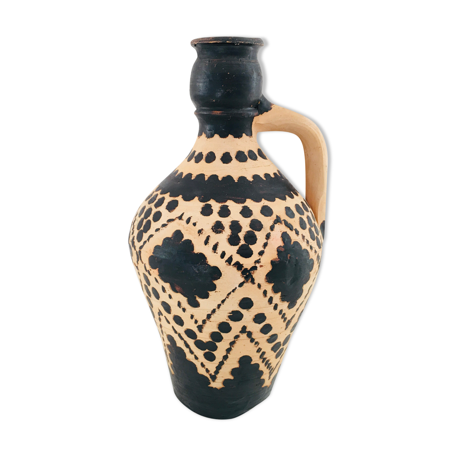 Raw and black terracotta jug