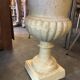 Pair of medicid vasques, cast, exterior