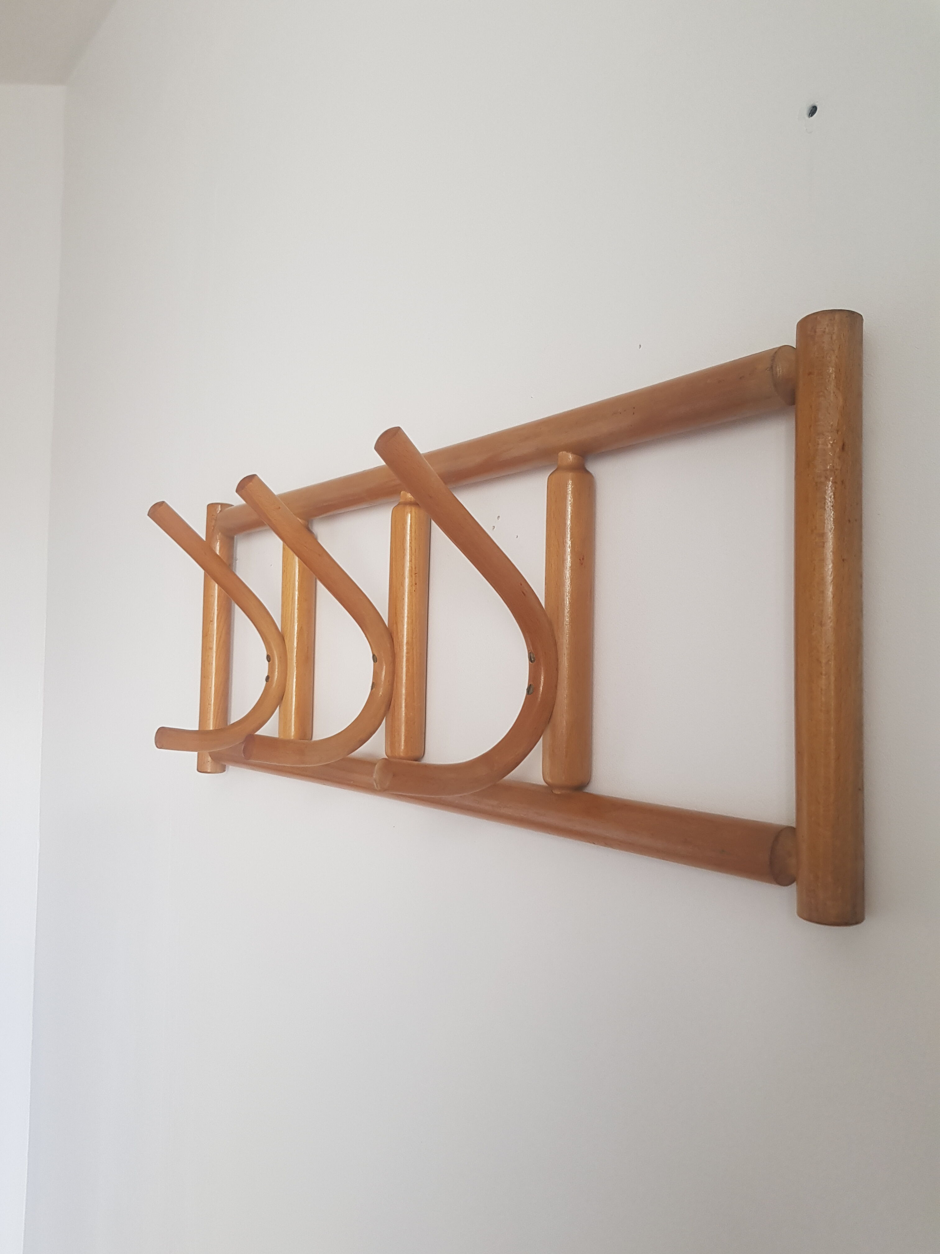 Wooden wall coat rack